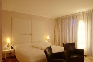 Krevet ili kreveti u jedinici u okviru objekta Hotel des Balances