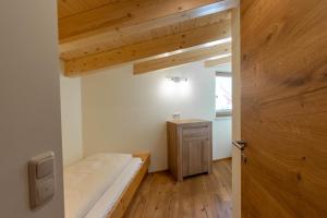 A bed or beds in a room at Pension&Appartements Marxenhof