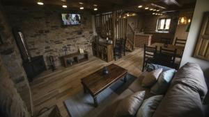 an overhead view of a living room with a couch and a table at Las vistas in Cornellana