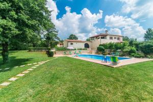 Πισίνα στο ή κοντά στο Villa Catarina with Beautiful and Spacious Garden and Pool