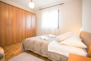 Posteľ alebo postele v izbe v ubytovaní Comfortable Villa Marinela with Pool and Garden + 19 fotografií