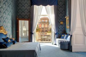 A bed or beds in a room at La Casa Sul Nilo