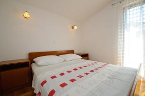 Posteľ alebo postele v izbe v ubytovaní Hella Apartments