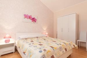 Postel nebo postele na pokoji v ubytování Villa Paris III + 20 fotografií