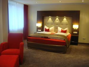Tempat tidur dalam kamar di Boutique Hotel Villa Melsheimer