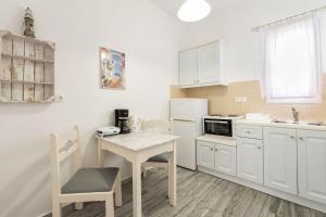 Kuchyň nebo kuchyňský kout v ubytování Apartments Tarsa