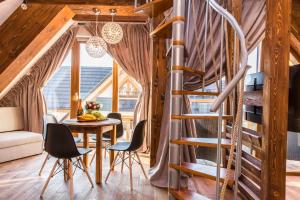 Posezení v ubytování POD SKOCZNIA SPA Zakopane