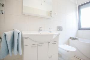 Vannituba majutusasutuses Apartments Sara