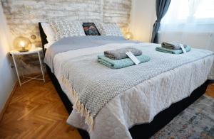 Posteľ alebo postele v izbe v ubytovaní Villa Inda Rooms