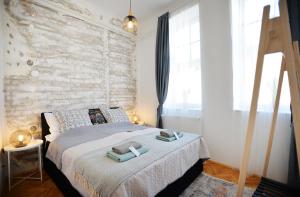 Posteľ alebo postele v izbe v ubytovaní Villa Inda Rooms