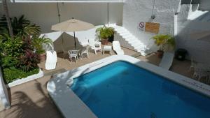 Bazén v ubytování Hotel Antillano nebo v jeho okolí