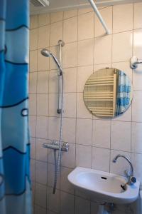 a bathroom with a shower and a sink at Quisisana in Buren +77 photos