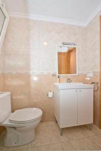 Et badeværelse på Apartamento vacacional "La casa de la Playa" con wifi y 3 dormitorios