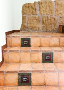a stack of old bricks stacked on top of each other at Hospedium Hotel Posada De La Luna in Huesca
