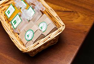 a basket with clocks on it sitting on a table at Hospedium Hotel Posada De La Luna in Huesca