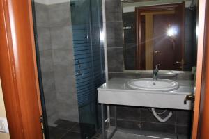 Koupelna v ubytování Hotel Livia