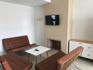 Televízia a/alebo spoločenská miestnosť v ubytovaní City Park Buenos Aires Suite