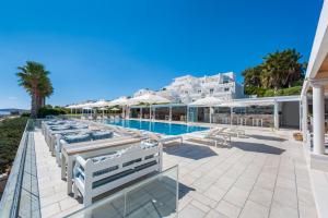 a view of the pool at the resort at Saint George Hotel in Chrissi Akti