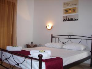 Postel nebo postele na pokoji v ubytování Hotel Alexandra