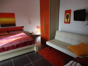 Postel nebo postele na pokoji v ubytování B&B Terra Marique