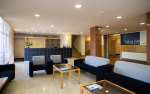 The lobby or reception area at Laterum Economy