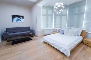 Postel nebo postele na pokoji v ubytování Luksusowy apartament Świętego Jana na Rynku