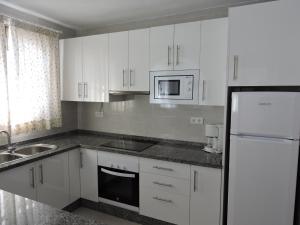 A cozinha ou cozinha compacta de Nerja Villas-Capistrano
