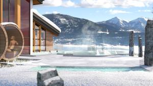 a rendering of a resort with a fountain and mountains at Chalet Ma Neou Village Vacances in Les Angles