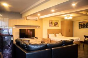 Classic Serviced Apartments tesisinde bir oturma alanı