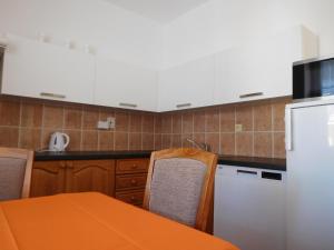 A kitchen or kitchenette at Pension Najdek