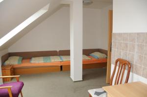 Postel nebo postele na pokoji v ubytování Penzion Pupendo