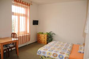 Postel nebo postele na pokoji v ubytování Penzion Pupendo