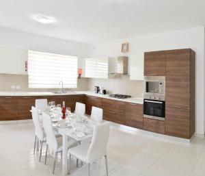 Cuina o zona de cuina de Lorenza Letting Maisonette