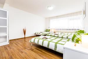 Ein Bett oder Betten in einem Zimmer der Unterkunft Workers Apartment am Wiener Platz