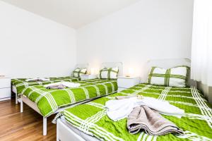 Ein Bett oder Betten in einem Zimmer der Unterkunft Workers Apartment am Wiener Platz