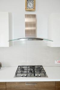 Cuina o zona de cuina de Lorenza Letting Maisonette