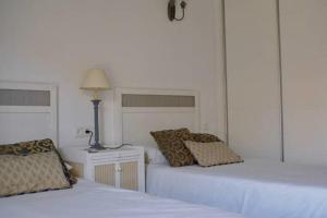 Postel nebo postele na pokoji v ubytování Apartamento Mar de Alborán