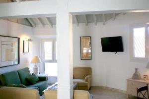 TV a/nebo společenská místnost v ubytování Apartamento Mar de Alborán