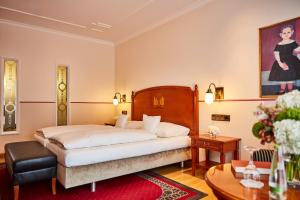 Postel nebo postele na pokoji v ubytování Allee Hotel