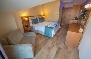 Postel nebo postele na pokoji v ubytování Dalyan Live Spa Hotel
