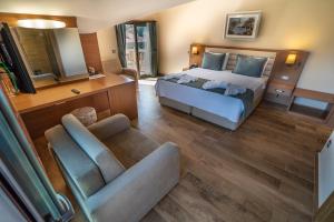 Postel nebo postele na pokoji v ubytování Dalyan Live Spa Hotel