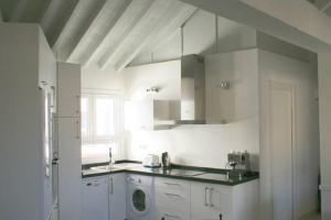 Kuchyň nebo kuchyňský kout v ubytování Apartamento Mar de Alborán