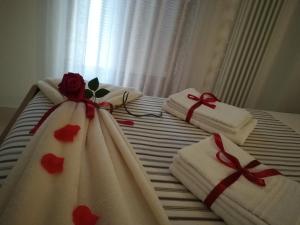Łóżko lub łóżka w pokoju w obiekcie La Casa Di Melory