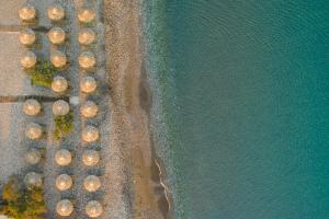 an overhead view of the beach and the water at Erato by Samian Mare in Karlovasi
