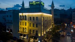 a building with a sign on the top of it at The Wings Hotel Istanbul in Istanbul