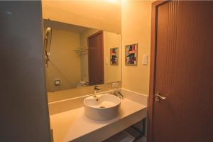 Koupelna v ubytování Henia Hotel