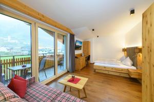 Postel nebo postele na pokoji v ubytování Appartement-Pension Kendlbacher