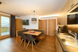 Kuchyň nebo kuchyňský kout v ubytování Appartement-Pension Kendlbacher