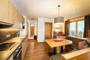 Kuchyň nebo kuchyňský kout v ubytování Appartement-Pension Kendlbacher