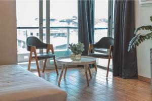 Posezení v ubytování Henia Hotel